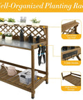 Garden Potting Bench With Metal Tabletop And Drawer Outdoor Potting Table Workstation With Storage Shelf And Open Shelf Fir Wood Potting Station With Lattice Back And Raised Edges For Tools, showing lattice back, bottom shelf, and hooks.