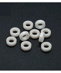 Top Shelf Full Ceramic Ball Bearing Sealed Zirconia ZrO2 ABEC 9 Hella Smooth 4x7x2.5mm white zirconia rings for custom motors.