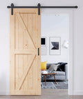 Rock Solid Spruce Sliding Barn Door 32 By 84 Inches With Heavy Duty Track Hardware and Modern Catch in a stylish room interior.