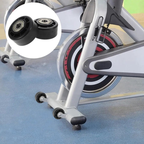 Universal Replacement Wheel Bearing Rollers For Treadmills And Exercise Bikes Heavy Duty Glide Casters on fitness bike, black set.