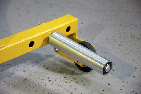 Close-up of Heavy Duty Rock Solid Tire Wheel Roller Dolly featuring ergonomic grip and smooth roller mechanism.