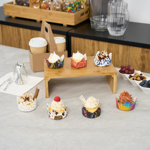 Greaseproof Cupcake Liners 4000 Pack, 4 Oz Disposable Muffin Cups For Oven Or Freezer on display with cupcakes