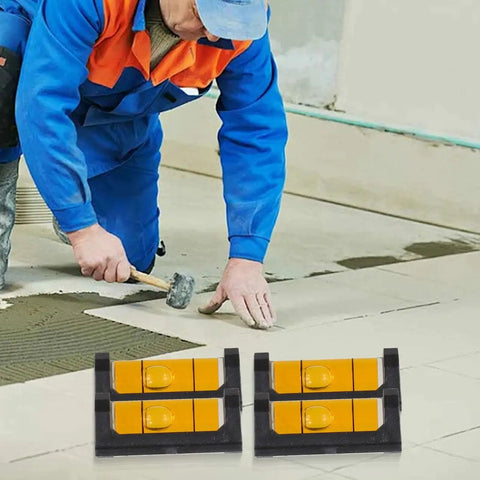 Worker using compact 4-Pack for mini Magnetic Level with Base, Compact Pocket for spirit on a tile project.