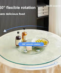 Big Boy Sized Round Lazy Susan With Dead Silent Glide 360 Degree Rotation Serving Tray built from bumper glass on a dining table.