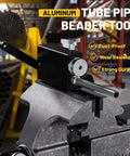Heavy Duty Bead Roller Tool For Tube And Pipe Beading, anodized aluminum and stainless steel, fitted on vice in industrial setting