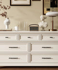 White dresser with 10 Pack Matte Black Cabinet Handles Made From Solid Zinc Alloy With Corrosion Resistant Coating For Durable Kitchen Cabinet Pulls And Dresser Drawers 3 Inch Hole Center Flat Modern Hardware installed.