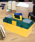 Heavy Duty Plastic Toolbox Organizer With Reinforced Grip For Job Site Hardware And Straight Up Rugged Storage That Keeps Your Gear Locked Down And Ready To Roll Anywhere on a workbench with tools.