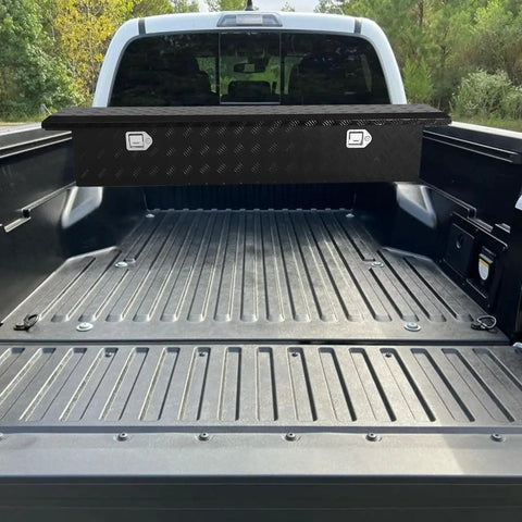 69 Inch Heavy Duty Crossover Aluminum Truck Toolbox With Rust Proof Secure Slam Latch Pickup Bed Storage Chest For Contractors built over a truck bed.