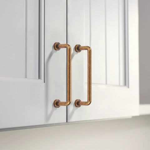 Top Tier Two Pack 3 Inch Center Antique Brass Cabinet Pulls Vintage Kitchen Drawer Handles Hardcore Zinc Alloy on white cupboards.
