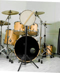 Badass Telescopic Drum Rack Storage Setup For Practice Pads Snare Brackets with snare on black stand in music studio.