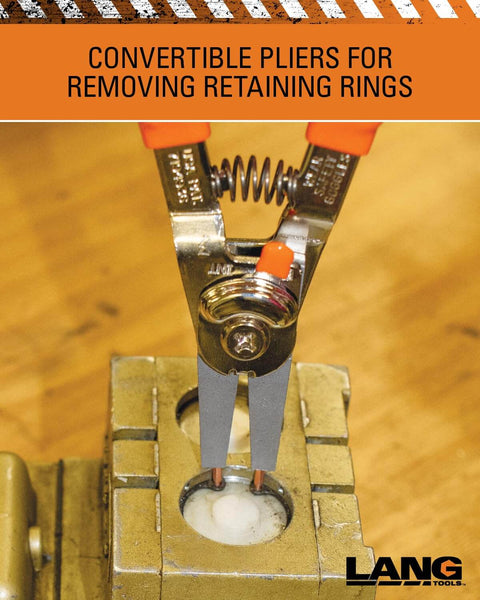 Model 1434 Internal And External Quick Switch Retaining Ring Pliers with orange tips shown removing a retaining ring on metal