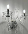 Elegant Crystal Wall Sconce Candles Set Of 2 For Living Room Bath Entryway Hallway Hardwired Classic Wall Lights With Glam Crystal Accents And A Lit Glow For Hotels Galleries Exhibition Rooms. Two illuminated crystal wall sconces with detailed accents.