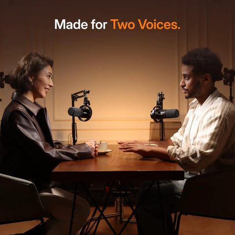 Hybrid Wireless Podcasting Dynamic Microphone Ditch The Tangles With Usb And Xlr Ports For High Quality Streaming Hassle Free Plug And Play Mic Bundle For Streamers on a table with two hosts.