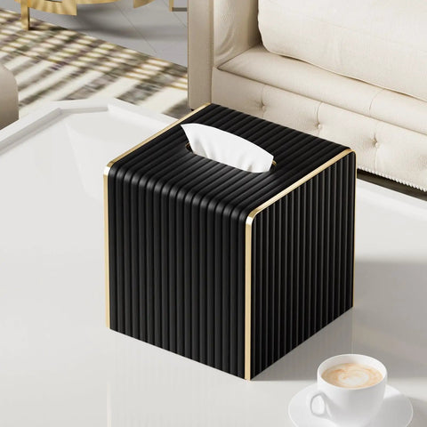 Black Square PU Leather Tissue Box Cover With Gold Tone Edging Luxury Vibe For Living Room Bedroom Bathroom Desk Or Office Coffee Table Decor That Feels Boss Level Dope on a white coffee table.