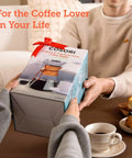 Person receiving a Pour Over Coffee Maker with Double Layer Stainless Steel Filter for Rich, Smooth Flavor, 8 Cup 34oz Drip Brewer gift box