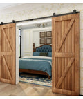 Built Tough Barn Door Hardware Kit 4 Foot Sliding Rail System Double Wood Doors with smooth glide feature in bedroom