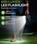 Person holding Beast Portable Car Jump Starter With Air Compressor 6000A Peak 160 PSI showing LED flashlight feature in use at night