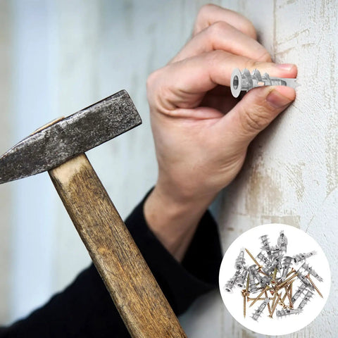 Person inserting a Heavy Duty Drywall Anchor Kit With Screws, 20 Sets, Self Drilling Zinc Alloy And Iron, Easy Insertion in wall.
