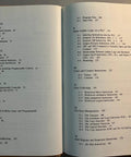 Open book showing contents section on programmable controllers, part of the guide 'Programmable Controllers And Designing Sequential Logic A Practical No Nonsense Guide For Industrial Controls Microprocessor Interfaces And Real World Control Projects' with headings on digital logic and ladder logic.