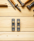 Superior Heavy Duty Stainless Steel Sliding Window And Patio Door Roller Assembly 88 Type Replacement Pulleys Double Pack on wooden surface with tools.