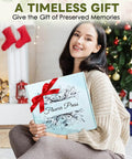 Woman holding 11x11 Inch Dope Extra Large Flower Press Kit With 10 Wooden Layers for adults and teens, Christmas setting in background.