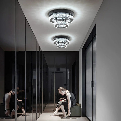 Crystal Chandeliers For Dining Room And Hallway Lighting, Chrome LED Ceiling Light, Semi Flush Mount, Clear Crystal Drops, 9.8 Inch Wide, 6000K Daylight White illuminating a hallway