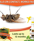Close-up of dead fly next to product bottle, All In One Indoor And Outdoor Pest Buster For Fleas Ticks Ants Spiders Bed Bugs Dust Mites And More 128 oz.