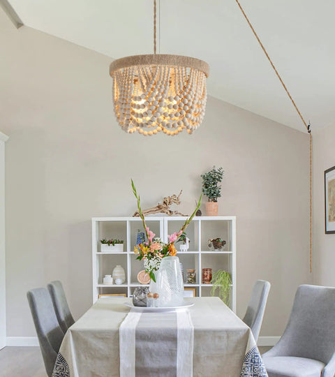 Boho Beaded Flush Mount Ceiling Light 3 Light Fixture In Rustic Antique White Wood Beads over dining area table setting.