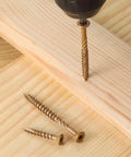 Image of Freakin Strong Size 6 X 1 Inch Deck Screws 300 Piece Set with Torx drive and spiral flutes in wood.