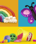 Massive Bulk Modeling Compound With Twelve Four Ounce Cans Packing A Knockout Array Of Jewel Tones Absolutely Perfect For Kid Safe Arts Projects and Creative Crafting Vibes - colorful clay creations including a rainbow and butterfly.