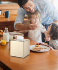 Family breakfast scene with Hand Tissue Box Cover Decorative Square Tissue Holder for Bathroom Vanity Dresser Nightstand Office Parlors Champagne Gold Finish Sleek Modern Square Design Keeps Tissues Neatly Stored And Elevates Your Space