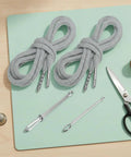 Get Your Shorts Back On Track With This Sweet Drawstring Replacement Cord Kit Featuring Rock Solid Metal Aglets And A Nifty Threader For Hassle Free Repairs On Hoodies Pants And Waistbands In Light Blue.