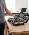51 Piece Ratchet Socket Set With Multiple Sockets, Adjustable Tension Wrench, Handy Case on a workbench in a garage setting