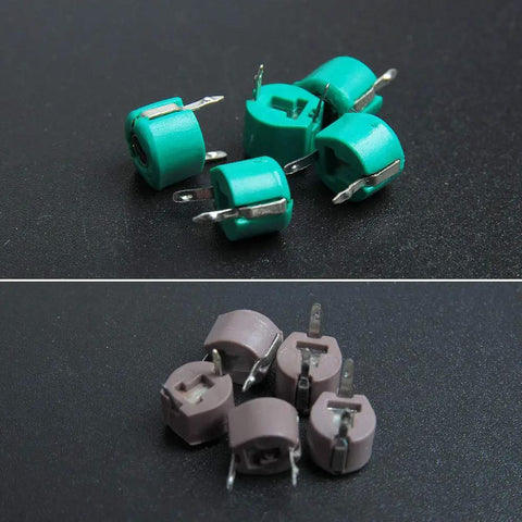 Awesome 45 Piece 6Mm Trimmer Capacitor Kit Featuring Nine Separate Values For Quick Radio Circuit Adjustments And Totally Hassle Free Weekend DIY Repair; green and gray trimmer capacitors with pins.