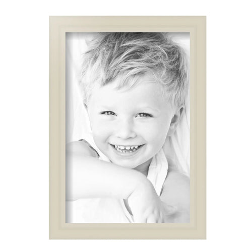 Fresh White Wooden Photo Frame 8X12 Inch Ready To Hang Clean Wall Decor With Crystal Clear Glass displaying smiling child portrait.