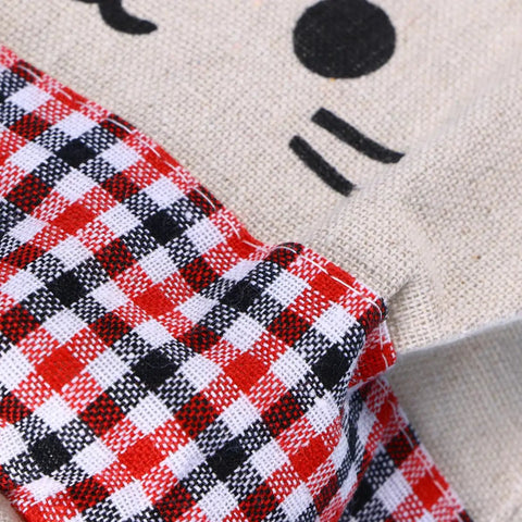 Close-up of fabric detail on the Wall Mounted Hanging Storage Bag Organizer With Solid Wooden Bar For Closets And Doorways.