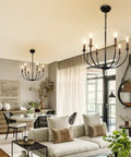 Six Light Black Farmhouse Industrial Metal Chandelier With Classic Candle Pendant Style in modern living room setting