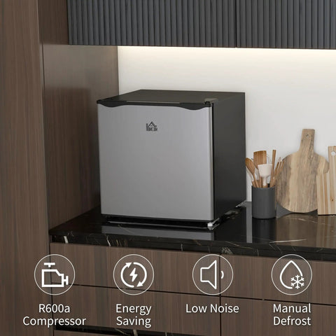 Sick Silver Mini Freezer With 1.1 Cu Ft Storage Capacity Featuring Reversible Door on modern kitchen counter.