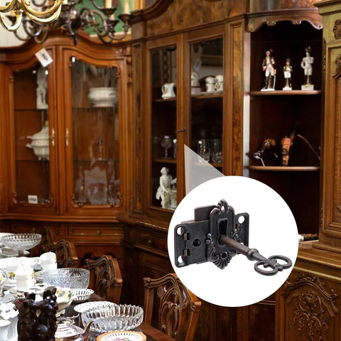 Top Shelf Antique Iron Cabinet Lock For Tiny Curio Showcases And Dashing Keepsake Jewelry Boxes Including Rustic Vintage Keys close-up in elegant dining area.