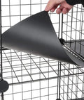 Hand inserting shelf liner into Six Cube Wire Storage Organizer Shelf For Books Toys Clothes And Tools, 12 Inch By 12 Inch By 12 Inch DIY Cube Shelf