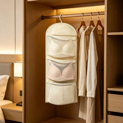 Compact Triple Tier Hanging Closet Organizer With Airy Mesh Pockets Ideal For Bras Bottoms And Socks, featuring three shelves with bras.