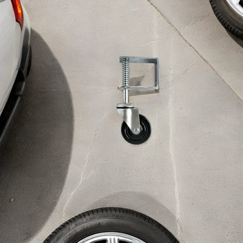 Badass Four Inch Heavy Duty Rubber Spring Loaded Gate Caster Wheel For Smooth Fence Gate Roll Stress Free Quick Swap Setup Built Tough With Solid Load Support And Zero Hassle mounted on concrete floor.