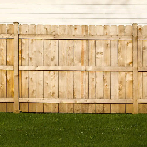 Wooden fence installed with PrimeGuard Plus Wood To Wood Deck Screw Tan Two And One Half Inch Self Starting Type 17 Point