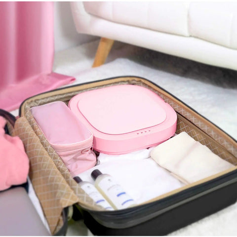 Compact Portable Washing Machine Mini Foldable Electric Washer Dryer Combo Energy Efficient Laundry packed in suitcase for travel.