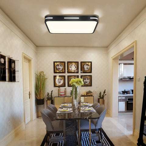 Dimmable LED Ceiling Light Fixture With Remote Control, Dope Flush Mount Ceiling Lamp illuminating a dining room with decor.