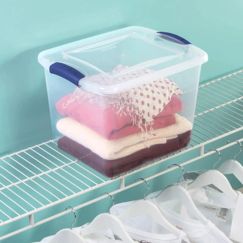 Heavy Duty Clear Storage Bins 2 Pack With Tight Blue Latches stacked on a shelf holding folded clothes.