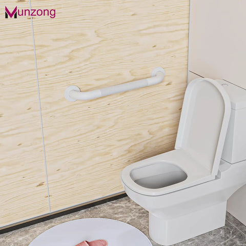 Built Like A Tank Anti Slip Shower Grab Bar Kit With Reliable Stability That Never Lets You Down Includes Three Wall Mount Handrails Perfect For Senior Bathrooms And Easy Bathroom Upgrades In Clean White, showing a white handrail mounted next to a toilet.
