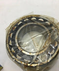 High Performance Grade 22209EB33J30 Spherical Roller Bearing in packaging showing precision machining for industrial use.
