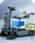 Industrial Floor Sweeper Machine For Warehouses with large capacity dustpan and easy controls in sleek design.