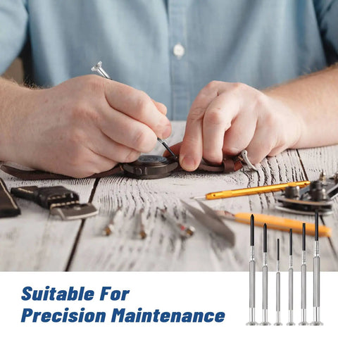 Person using Six Piece Mini Precision Screwdriver Set With Flathead And Phillips Bits For Watches, Jewelry, Eyeglasses, Toys, Computers, And Electronics Repairs, Built Tough With Rust Resistant Black Oxide Shafts, Compact Handy Kit For Quick Fixes at workbench.